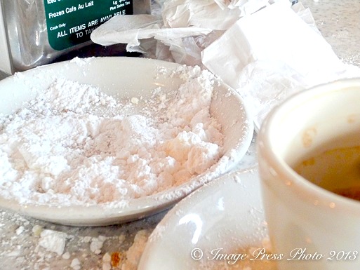 Only an empty plate and a pile of sugar remains after a trip to Cafe du Monde