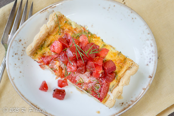 Serve the tart garnished with more fresh snipped dill