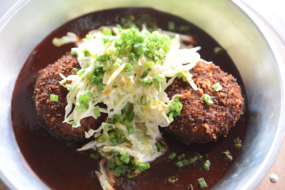 Pork cakes with sorghum, green onions, and slaw from Fest BBQ