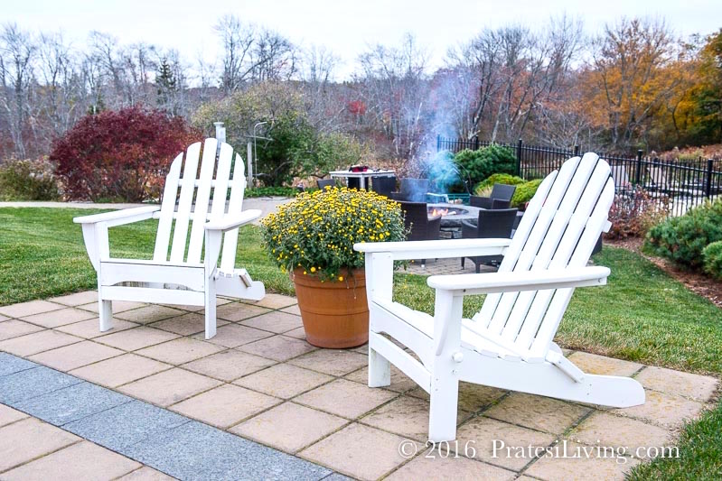 Sit outside and relax on the Adirondack chairs on the lawn