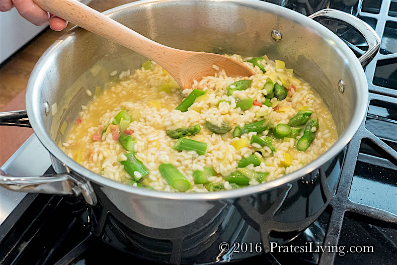 Add the asparagus to the risotto toward the end of the cooking time