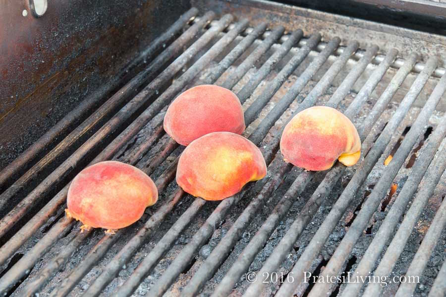 Brush a little of the dressing on the flesh side of the peach before grilling